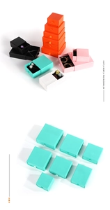 Various sizes of colorful drawer jewelry boxes with foam inserts in minimalist style