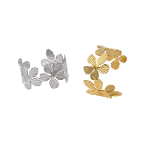 Minimalist 18K gold and silver floral bangle with textured radial pattern for women