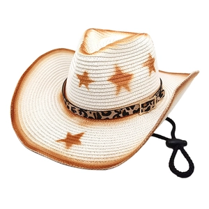 Detail of western straw hat with brown star print, leopard band, and adjustable wind cord