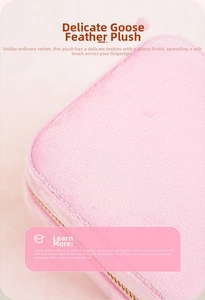 Macro detail of soft pink velvet fabric texture and golden zipper on jewelry box