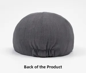Detail back view of a dark grey newsboy cap with elastic band for adjustable sizing