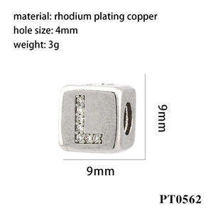 Detailed view of silver letter L charm bead with 4mm hole and inlaid zircon stones