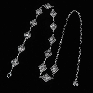 Silver vintage bohemian metal waist chain with engraved rhombus elements and rose pendant