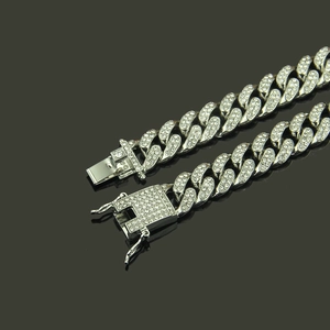 Detail of silver Miami Cuban link necklace with full diamond inlay and secure buckle