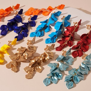 Colorful petal tassel clip-on earrings in assorted vibrant colors on a neutral background