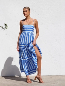 Blue and white striped backless maxi dress with tiered skirt and high side slit