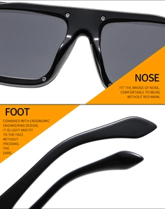 Detail view of ergonomic nose pads and comfortable temple tips of black sunglasses