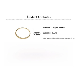 Detail view of 18k gold plated bangle with wavy texture and dimensions 6.5cm by 5.5cm