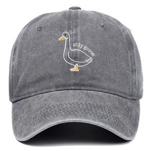 Washed dark grey baseball cap with silly goose embroidery in a retro vintage style