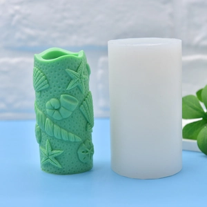 Cylindrical silicone mold for DIY crafts featuring sea star and shell embossed patterns