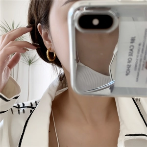 Fashionable chunky gold C-shaped hoop earrings for women with a polished metallic finish