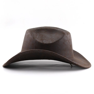 Close-up of dark brown vintage cowboy hat with realistic faux leather cracked texture
