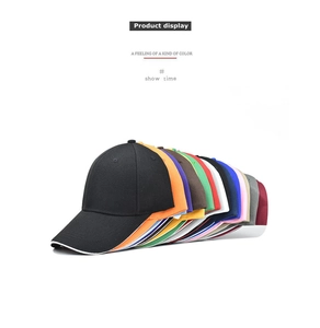 Multiple rows of solid color baseball caps showing diverse options and curved brims