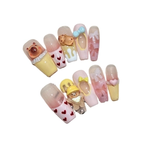 Hand-painted Capybara press-on nails with 3D bear and bow details in long coffin shape