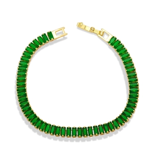 Gold chain bracelet with rectangular emerald green zircons and a secure fold-over clasp