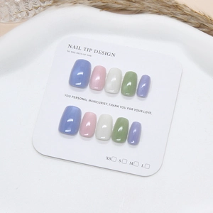 Handmade cat eye press-on nails set in pastel blue pink and green for stylish women