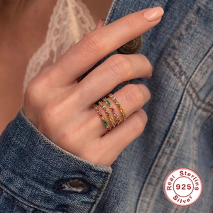 Set of four S925 sterling silver rings with colorful marquise zircon stones worn by a model