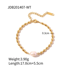 Gold beaded chain bracelet with freshwater pearl and lobster clasp on white background
