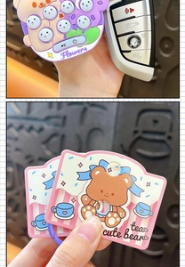 Adorable bear whack-a-mole game machine keychain for bag charm and gift accessory.