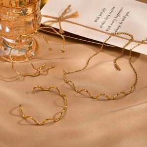 Polished 18K gold plated stainless steel wave jewelry set with necklace and earrings