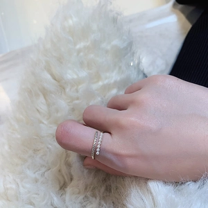 Double-layered gold plated ring with white pearls and sparkling cubic zirconia stones