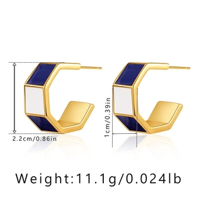 Detail showing geometric hexagonal gold earrings with blue and white enamel inlay