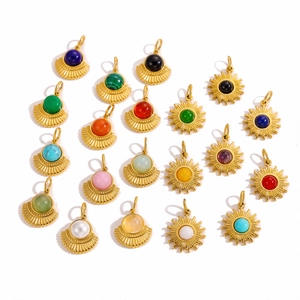 Bohemian gold pendants with sunburst and pleated designs featuring colorful gemstones