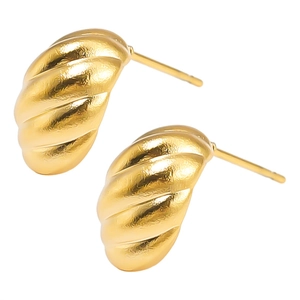Macro shot of 304 stainless steel earrings with gold plated textured croissant pattern