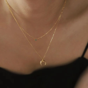 Double layered gold titanium steel necklace with green gemstone and crescent moon pendant