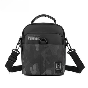 Close-up of front view of large capacity camouflage messenger bag with multi-layer zippers