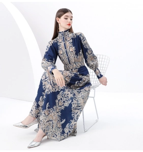 Detailed view of retro floral long-sleeve dress with stand collar and lantern sleeves