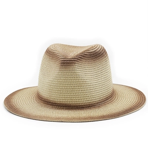 Detail showing the woven straw texture and dark brown gradient stripes on the brim and crown