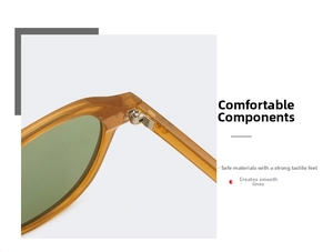 Macro detail of amber acetate frame with durable metal hinge on trendy sunglasses
