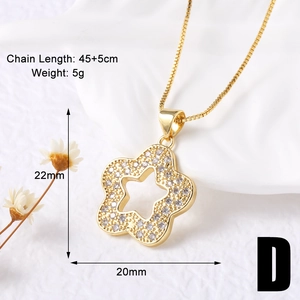 Detailed view of a gold flower star pendant with white zircons and dimensions overlay
