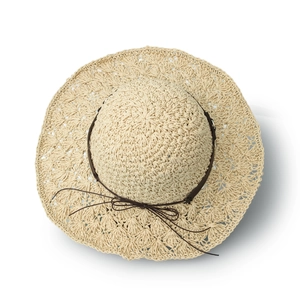Detail of light beige crochet sun hat featuring hollow petal edges and a dark brown bow cord