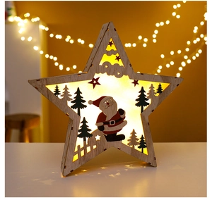 Detail of wooden Christmas star light with warm LED silhouettes and laser-cut design