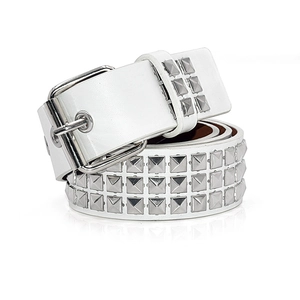 Detail of white leather belt with silver pyramid studs and polished metal buckle