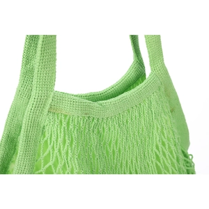 Close-up of light green knitted mesh tote bag showing detailed woven texture and handle