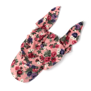 Detailed close-up of pink floral kids sun hat with rabbit ears on white background
