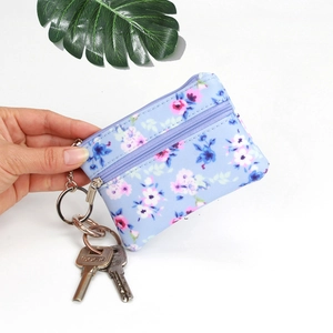 Floral print mini coin purse with metal keychain and zipper in soft purple and blue