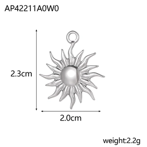 Detail of stainless steel sun pendant showing 2.3cm height and 2.0cm width dimensions