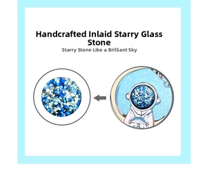 Macro detail of astronaut pendant featuring handcrafted glazed starry stone inlay