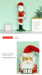 Detail of hand-painted wooden Santa Claus nutcracker with Christmas advent calendar blocks