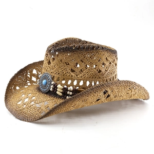 Brown woven cowboy straw hat with ethnic beaded band and turquoise stone detail