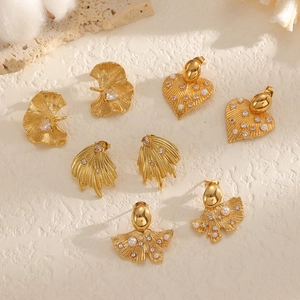 Golden leaf and fan-shaped stud earrings set with crystals and faux pearls