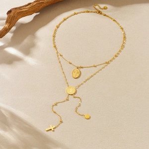 Gold-plated stainless steel layered necklace with relief medallion and cross pendant