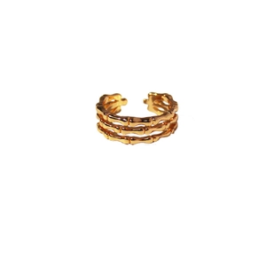 Elegant gold triple-layered bamboo-style open adjustable ring for women on white background
