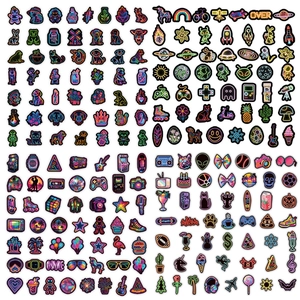 Flat lay of diverse neon style waterproof stickers including space and animal designs