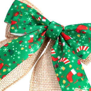 Double-layer burlap Christmas bow with green ribbon featuring festive holiday patterns