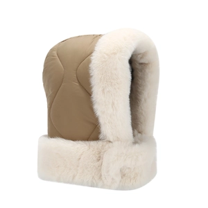 Thick khaki quilted trapper hat with white faux fur lining and earflaps for winter warmth